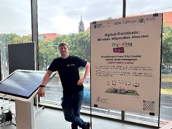 City employees at a citizen participation kiosk